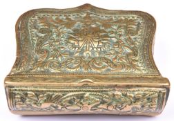 A Caucasian brass patch or cartridge box, approx 4½” x 4¾”, with hinged lid, embossed overall with