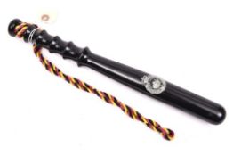 A presentation truncheon of the Royal Hong Kong Police (1967-1997) thickly black lacquered, with