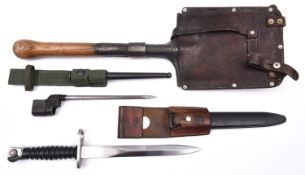 A Swiss M1957 S.I.G. assault rifle bayonet, export version, in its scabbard with leather frog,