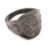 A Third Reich Commemorative bronze ring, embossed with tank and DAK motifs. VGC £30-40.