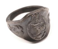 A Third Reich Commemorative bronze ring, embossed with tank and DAK motifs. VGC £30-40.
