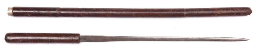 A WWI period officer’s leather covered swagger stick, with 13½” concealed blade, etched “Swaine &