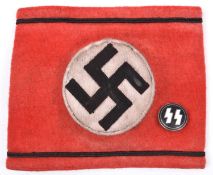 A Third Reich SS Allgemeine arm band, embroidered piping and swastika panel, metal securing