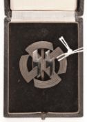A Third Reich Leistunge rune Proficiency badge, in bronze and enamel, in its case. GC £40-50.