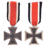 A 1939 Iron Cross 2nd Class, with ribbon, and another similar. GC (2) £70-90.