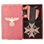 A Third Reich Spanish Cross for Dependants of German Fighters, complete with ribbon, in its card