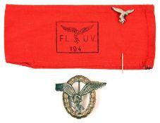 A Third Reich Pilot Observer’s badge, eagle and swastika silvered wreath gilt. A Luftwaffe tiepin;