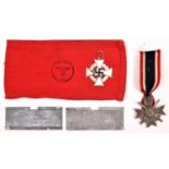 A Third Reich War Service cross with swords; a Stufe Cross 2nd grade silvered; a red armband with