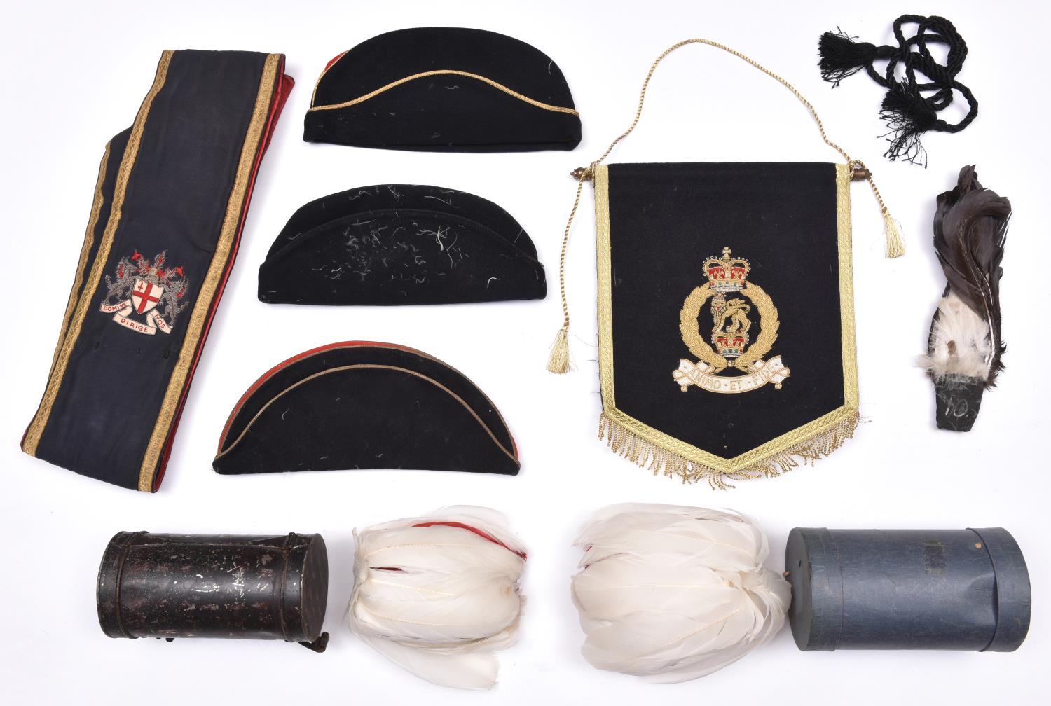 Three officers’ field caps: black with red centre and gold piping (2, one slightly mothed), and