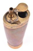 A 3 way brass mounted copper powder flask, 4½” overall, with tapered body and screw lid to base.
