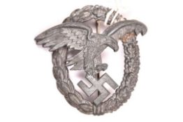 A Third Reich Luftwaffe Observer’s badge, of late war quality in matt grey zinc, with round wire