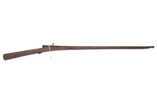 An Indian matchlock jezail, 65" overall, barrel 44½”, wood stock marked “500”, brass bands, GWO&C (