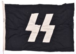 A Third Reich SS flag, 90cm x 57cm, black cloth with applique white runes, dated 1939. GC £250-300