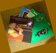 Approximately 100 33-1/3 rpm LP vinyl records of military bands, c 1980s, in their covers with paper