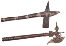 An African agricultural axe, with flat iron blade and wooden haft decorated with bands of white