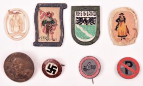 A Third Reich NSDAP enamelled lapel badge; a Hitlers Dank badge for Hanover and Brunswick; also 6