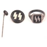 A Third Reich SS silver ring, with runes set in black enamel. An SS tie pin and circular enamelled