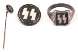 A Third Reich SS silver ring, with runes set in black enamel. An SS tie pin and circular enamelled