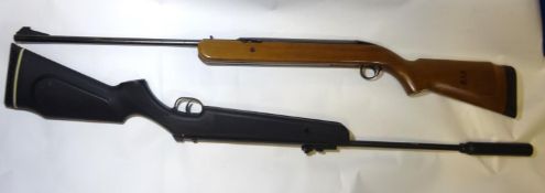 A .32” SMX SYNYS break action air rifle, no visible number, with black plastic stock and rubber