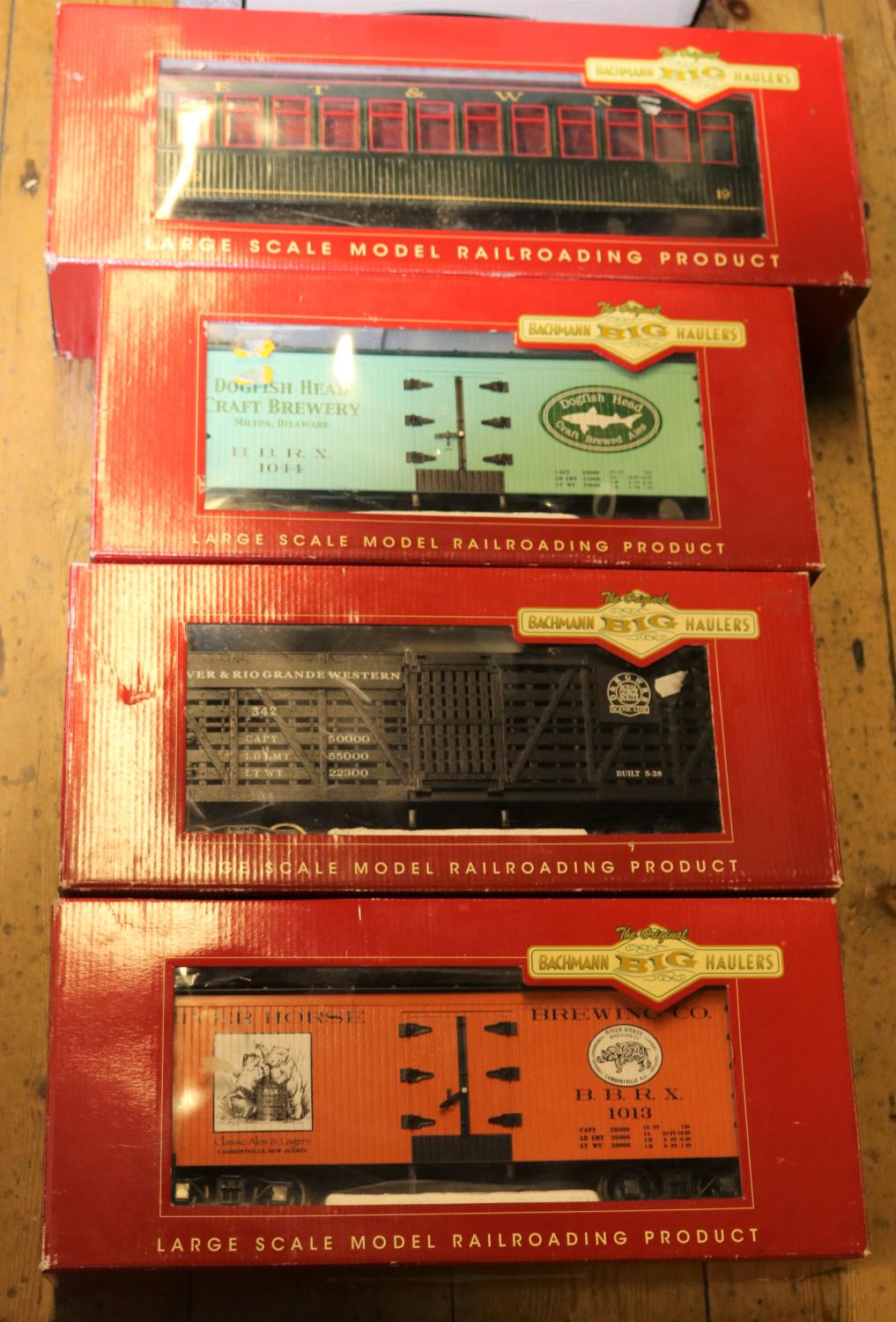 4x Bachmann Big Haulers G Scale items. 3x bogie freight cars; D&RGWRR Scenic Line open slatted wagon