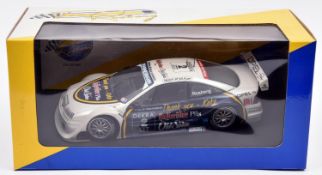 UT Models/Minichamps 1:18 scale Opel Calibra V6 Racing Car. An example in 'Team Rosberg' white, dark