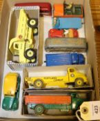 10 Dinky Toys. Leyland Comet Lorry with green cab and chassis, with orange body and green wheels.