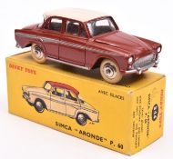 French Dinky Simca Aronde P.60 (544). In brick red, with silver side-flash and cream roof, ridged