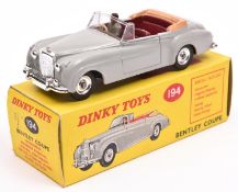 Dinky Toys Bentley Coupe (194). In light grey with maroon interior with fawn tonneau, complete