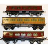 3x Hornby Series O gauge bogie coaches. A Metropolitan Railway Full First coach fitted with switch