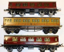 3x Hornby Series O gauge bogie coaches. A Metropolitan Railway Full First coach fitted with switch