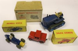 3 Dinky Toys. A Supertoys Heavy Tractor (563). A harder to find early example in dark blue with