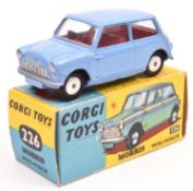 Corgi Toys Morris Mini Minor (226). In lilac with red interior, smooth spun wheels with black tyres.