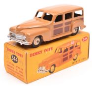 Dinky Toys Plymouth Estate Car (344). In tan with dark brown panels and fawn wheels and black