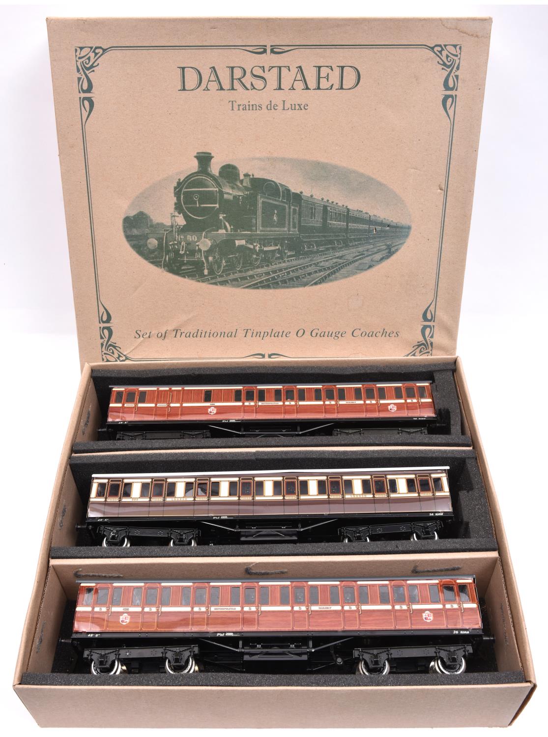 3x Darstaed O gauge compartment coaches. 2x Metropolitan coaches; a Full Third and a Brake Third,