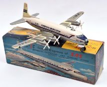 An impressive T.N. of Japan tinplate battery powered 1950's DC-7C 4 engined airliner. An example