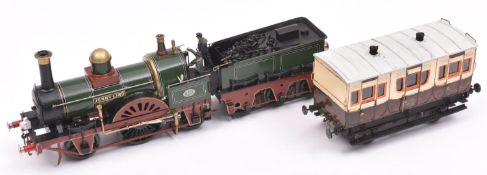 An O gauge model of an LBSCR 2-2-2 tender locomotive, Jenny Lind 70, in lined green livery. A well