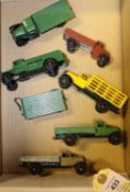 7x Dinky Toys. 25 series; A Wagon (25a) in light green. Petrol Tank Wagon (25d) in green. Tipping