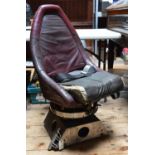 A Navigator's chair from a de Havilland DH.106 Comet passenger jet airliner. Maroon leather