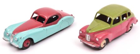 2 Dinky Toys Cars. Austin Devon in lime green and deep pink with cream wheels. Plus a Jaguar XK140