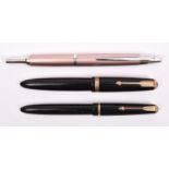 A Pilot Decimo capless vanishing point fountain pen in champagne. Together with a Parker Duofold and