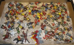 100+ lead Cowboys & Indians by Britains, etc. Including figures with tomahawks, rifles, head