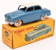 French Dinky Toys Simca 9 Aronde (24U). In mid blue, with cream roof, plated ridged wheels and white