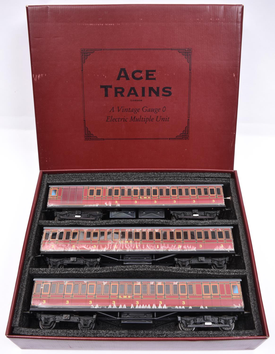 An Ace Trains O gauge LMS 3 unit EMU set in lined maroon livery for 3 rail running. Set comprising