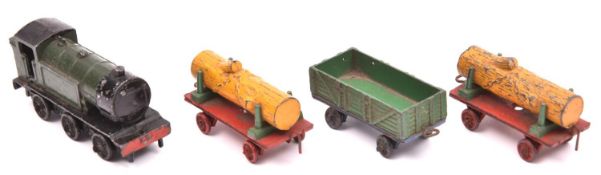 Dinky Toys Tank Goods Train Set. A made up set comprising a green/black locomotive, two yellow/red/