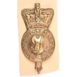 A Georgian universal pattern badge from a Tarleton helmet, c 1800, of die struck brass and