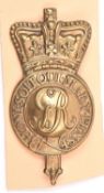 A Georgian universal pattern badge from a Tarleton helmet, c 1800, of die struck brass and