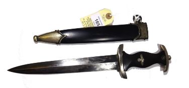 A Third Reich SS man’s dagger, blade 22cm, RZM 66 marked, black hilt with SS insignia and plated