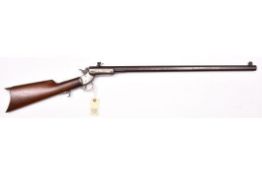 A .32” rimfire Stevens centre hammer tip down rifle, number 10431, 40½” overall, heavy octagonal