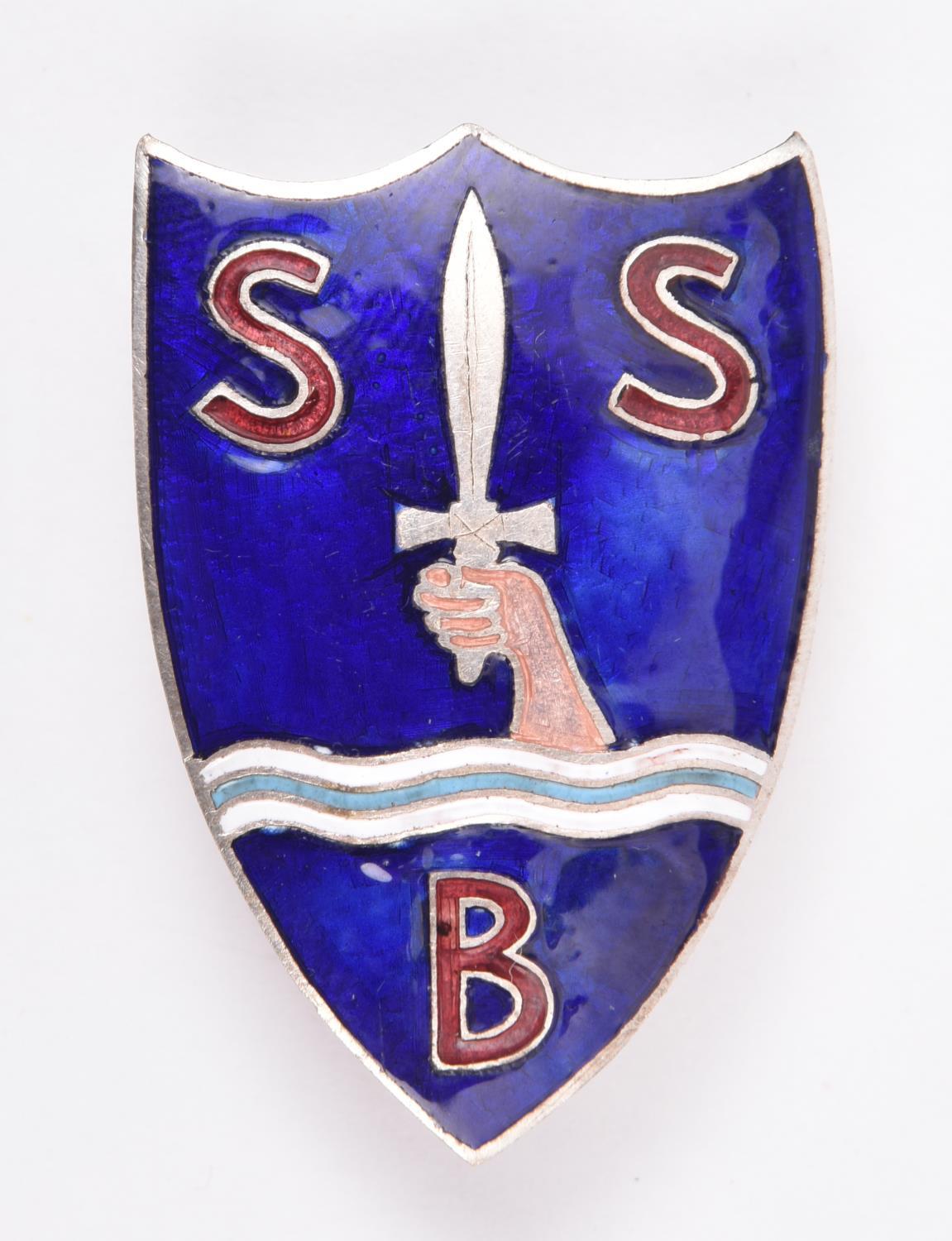 A beret badge of the Special Boat Section/Service, of white metal with blue and red enamel and two