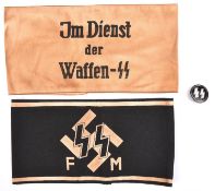 2 Third Reich printed armbands, Im Dienst Der Waffen SS and black with SS runes above “FM”; also